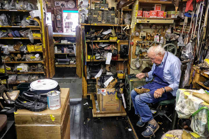 Pasquale DiTerlizzi repairs a shoe at Pasquale and Sons Shoe Repair in Toledo.   (Jeremy Wadsworth / The Blade)